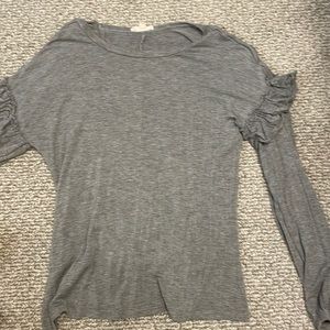 long sleeve, loose fitting, & ruffles on sleeve